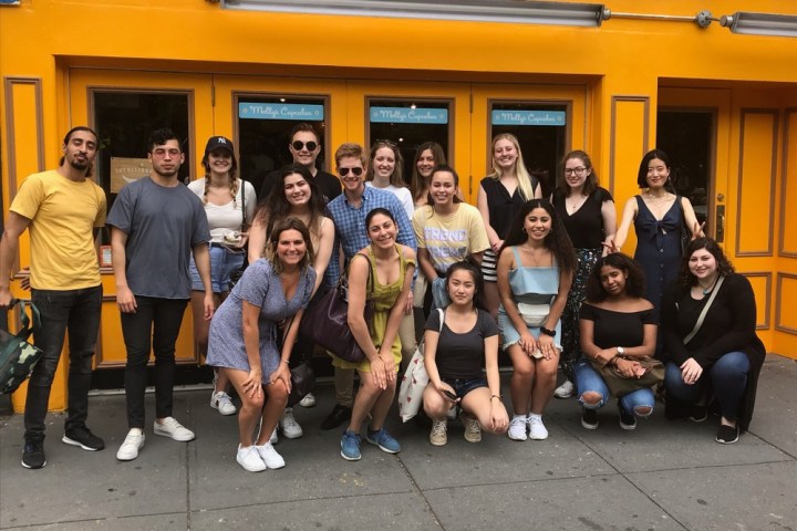 a group of people posing for the camera